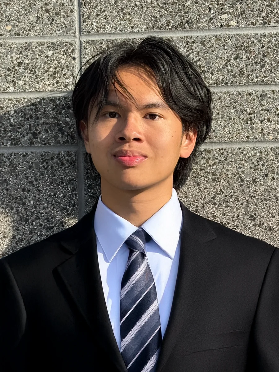 Dung Ho wearing a suit and tie